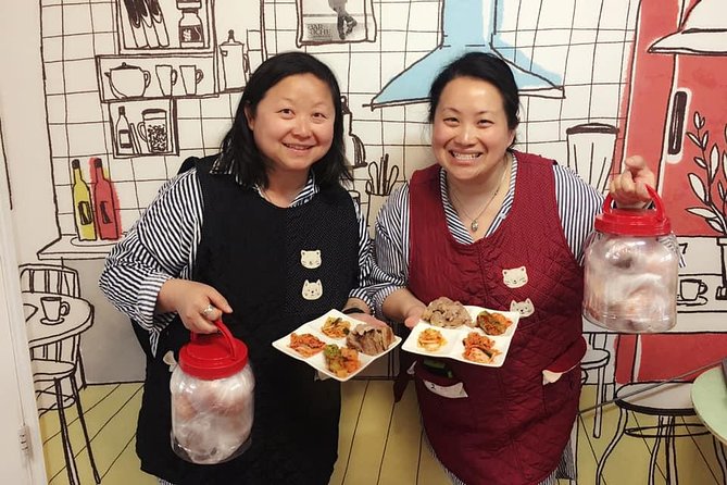 Korean Kimchi Making Day Experience with a Local Market Tour - The meal after: kimchi with boiled pork, fried tofu, and Korean comfort food