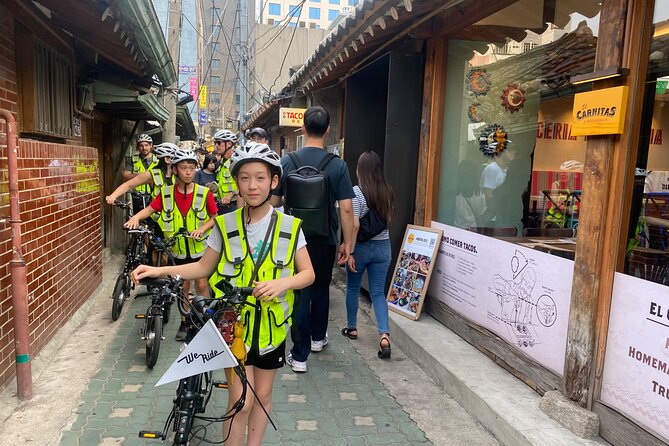 Market Food Tour & Evening E-bike Ride in Seoul - Palaces and main gates: Gyeongbokgung and Changdeokgung in the same ride
