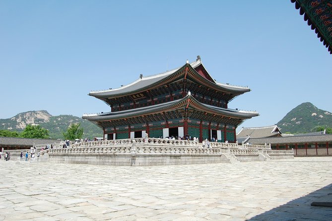 Seoul City Sightseeing Tour Including Gyeongbokgung Palace, N Seoul Tower, and Namsangol Hanok Village - Cheongwadae from the road, then Gyeonghwamun Gate and guard changing