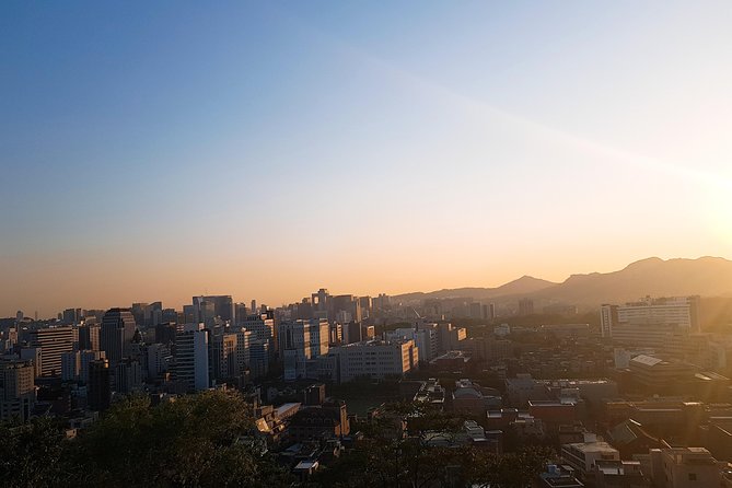 Seoul: Gyeongbok Palace, Bukchon Village, and Gwangjang Tour - Stop 3: Bugak Skyway (Bugak Palgakjeong) for Seoul views from Bugaksan
