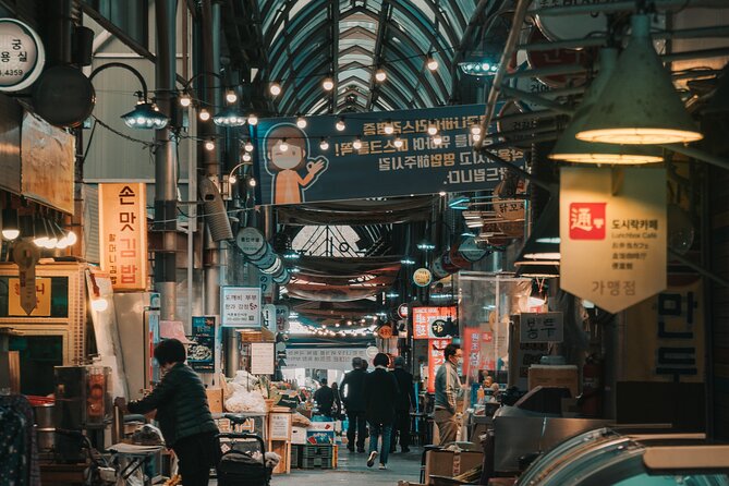 Seoul Night Palace & Market Food Tour with Vehicle - Changgyeonggung Palace After Dark: Night Views and a Sad Story