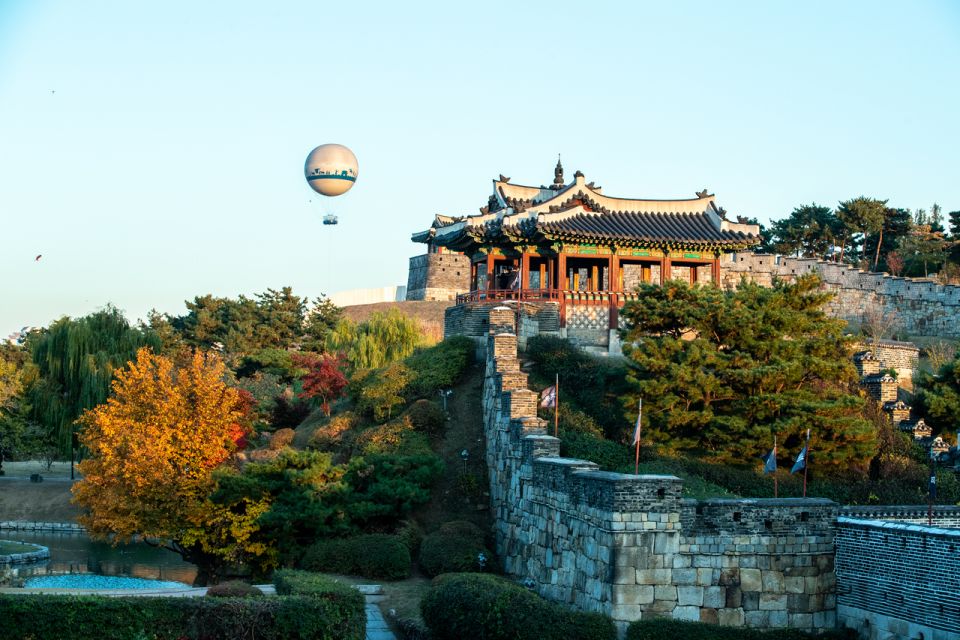 Seoul: Suwon Hwaseong Fortress & Korean Folk Village Tour - Nammun Market: Snack, Shop, and Watch Regular Suwon Life
